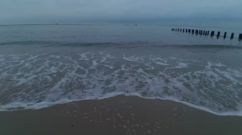 4K, Flying above the beach in cloudy day Video stock 68105106