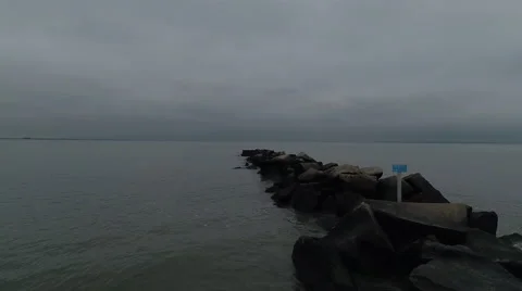 4K, Flying above beach in cloudy day Stockbeeldmateriaal 68105280