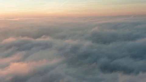 4K flying above the clouds with a beautiful golden clouds and sunset Stock Footage 126612240