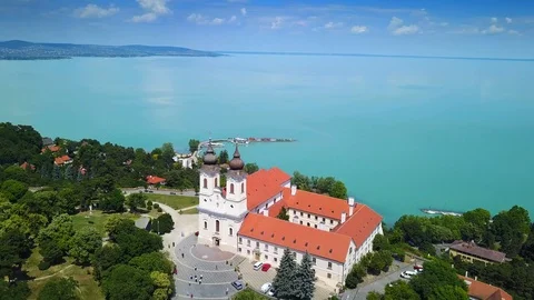 4K flying around full circle of Benedictine Monastery of Tihany Video stock 90953057