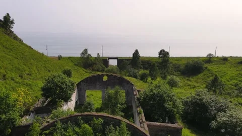 4K Flying over an abandoned, destroyed building on the shore of Lake Baikal. Stock Footage 159598609