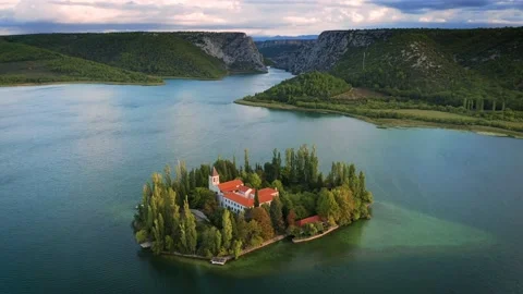 4K Flying over the amazing Visovac Christian monastery in Krka National Park Stock Footage 220173296