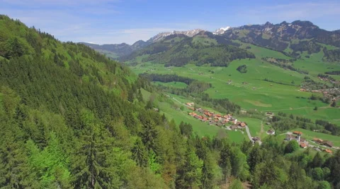 4K Flying over a mountain forest aerial shot Stock Footage 63757994