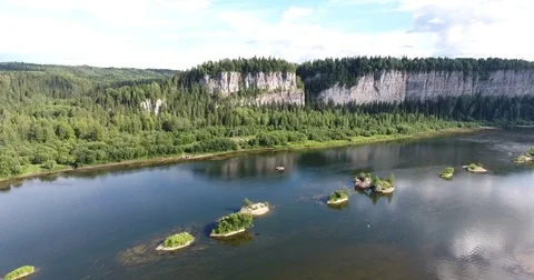 4K flying over the river to the cliffs Stock Footage 73299792