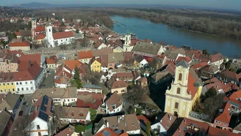 4K flying up by Saint Peter and Paul Church at Szentendre on a sunny winter day Stock Footage 149315279
