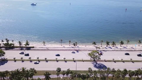 4k Flyover highway next to beach, moving traffic 스톡 동영상 82804157