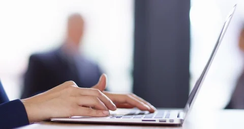 4K Focus pull from foreground to background business people working &amp; in meeting Stock Footage 104121919