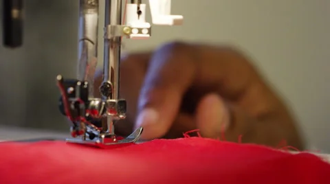 4K Focus pull from tartan cloth to sewing machine needle stitching fabric 스톡 동영상 56674130