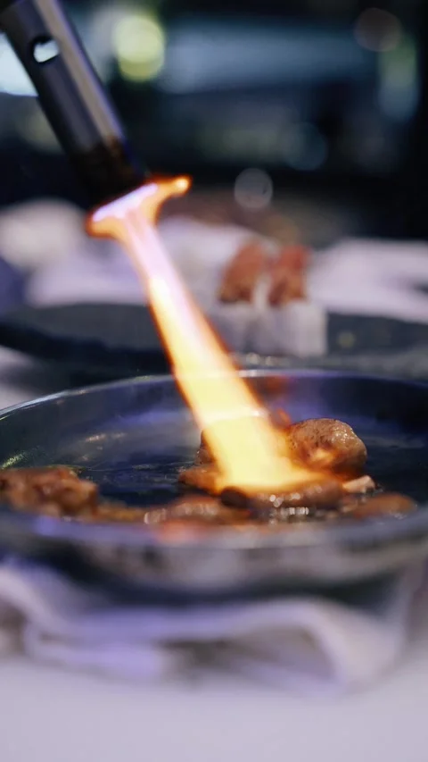 4K foie gras torched with flames at asian restaurant - vertical video Stock Footage 314682778