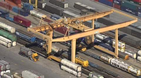 4K Follow industrial machine load container in port unloading dockland station Stock Footage 67387500