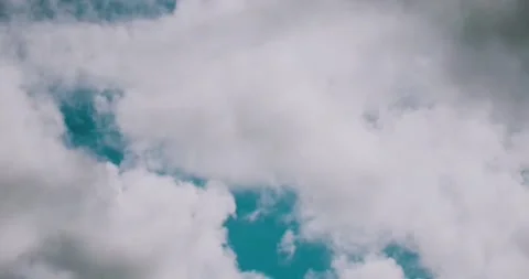 4K Footage of Beautiful Clouds Moving Across a Blue Sky Stock Footage 346457764