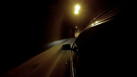 4K footage of a car going through the illuminated tunnel Stock Footage 71870542