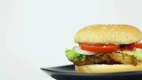 4k footage Delicious Beefburger sauce and topped sesame seeds. cooking. Big Video stock 336578722