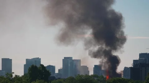 4K footage of a fire burning in a large metropolitan city. Stock Footage 277216732