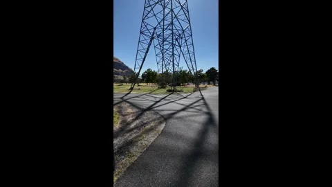 4K footage of high voltage power transmission tower and electrical lines in USA Stock Footage 341741105