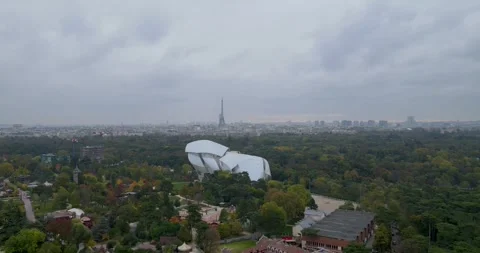 4K footage of the iconic Eiffel Tower rising above the beautiful Paris cityscape Stock Footage 322783854