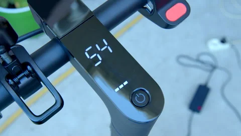 4k footage indicator of charge appear on scoreboard of the electric scooter Video stock 242232666