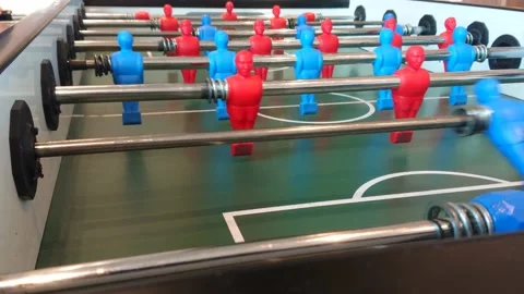 4k footage of playing Foosball or soccer table.  Stock Footage 178487064