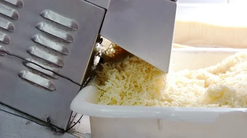 4K footage, Process of making cheese in a factory. slice cheese machine Video stock 70828352