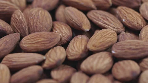 4K Footage. Rotating background of almonds Stock Footage 140579121