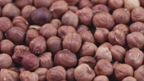 4K Footage. Rotating background of hazelnuts Stock Footage 140579411
