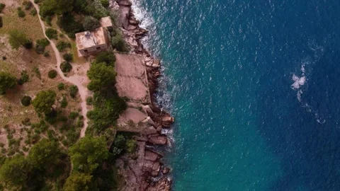 4K footage showcasing the dramatic cliffs and crystal-clear waters  Stock Footage 304667601