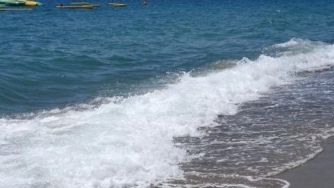 4k Footage of a waves breaking against a beautiful sand beach. Stock Footage 112263234