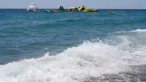 4k Footage of a waves breaking against a beautiful sand beach Stock Footage 112263279