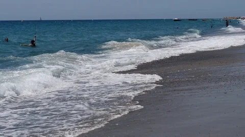4k Footage of a waves breaking against a beautiful sand beach Stock Footage 112263284