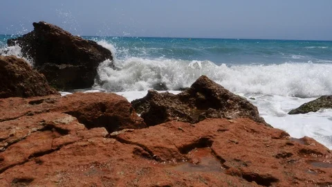 4K footage of a waves breaking against a beautiful white sand beach in the Spain Stock Footage 112263335