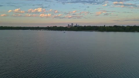 4K Forward Ascending Aerial View Of Sailboats On Lake Calhoun Minneapolis Stock Footage 220469508