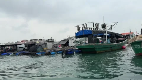 4K Forward Tracking Shot Through Traditional Danjia Floating Village and Fis Video stock 330914596