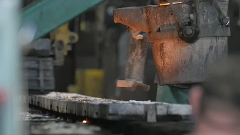 4K Foundry Hanging Cauldron and Iron Mold Stamp Stock Footage 98261626
