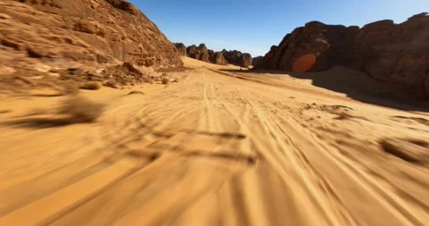 4k FPV Drone Shot flying down and along hill at speed in Saudi Arabia #21 Stock Footage 243102059