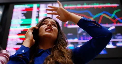 4K Frantic female traders buying at selling at city stock exchange Stock Footage 118970917