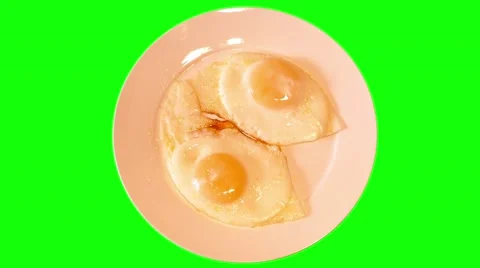 4k fried eggs on plate Stock Footage 49601732