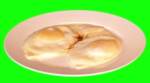4k fried eggs on plate Stock Footage 50000354