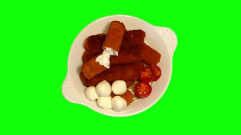 4k – Fried fish sticks with cherry tomatoes and mozzarella balls on plate Video stock 56464418