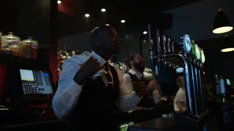 4K Friendly Bar Staff Dancing &amp; Enjoying The Atmosphere In Lively Nightclub Video stock 75653632