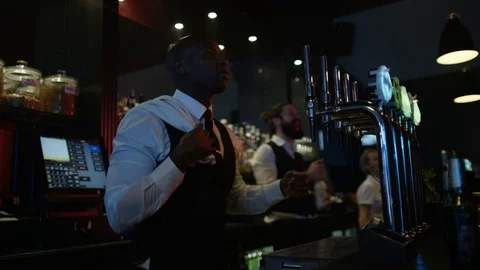 4K Friendly Bar Staff Dancing &amp; Enjoying The Atmosphere In Lively Nightclub 動画素材 75653882