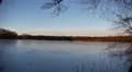 4k Frozen lake panning with trees in foreground 4k or 4k+ Resolution