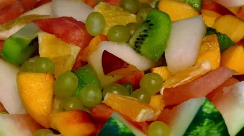 4k – Fruit salad of fresh fruit in watermelon Stock Footage 55880894