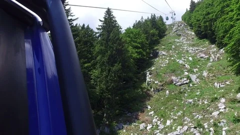4K. Funicular (cable car) is moving up to top of mountains, Slovenia. Vídeo Stock 78812873