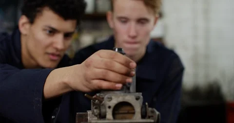 4K Funny concept of apprentice mechanics breaking motor parts &amp; walking away Video stock 112974855