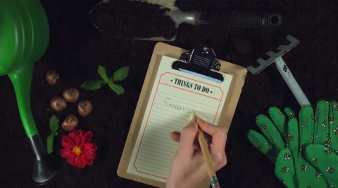 4k Gardening Composition of Hand Writing in Things to do list Video stock 68079087