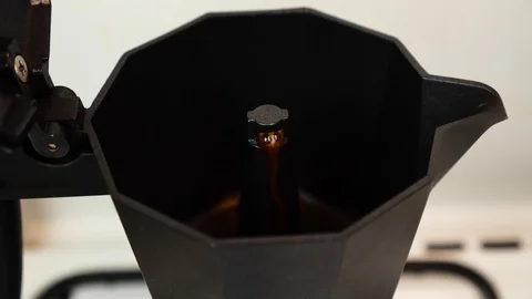 4K. Geyser coffee maker on white background. Italian espresso boiling close-up. Stock Footage 127431171