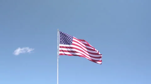 4K: Giant 60' * 40' US Flag Waves in a Stong Wind - Daytime Stock Footage 63087545
