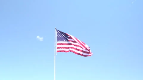 4K: Giant 60' * 40' US Flag Waves in a Stong Wind - Daytime Stock Footage 63087646