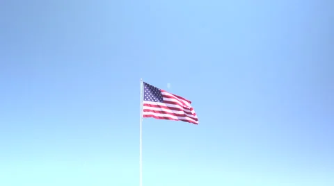 4K: Giant 60' * 40' US Flag Waves in a Stong Wind - Daytime Stock Footage 63087770