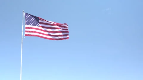 4K: Giant 60' * 40' US Flag Waves in a Stong Wind - Daytime Stock Footage 63087841